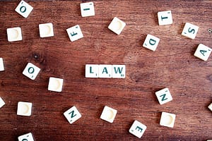 scrabble tiles forming the word law